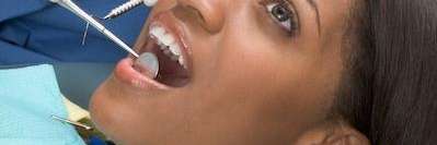 woman getting a dental checkup at a mesquite tx office